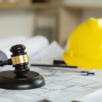Labor,And,Construction,Law,Concept.,Judge,Gavel,On,Building,Blueprint