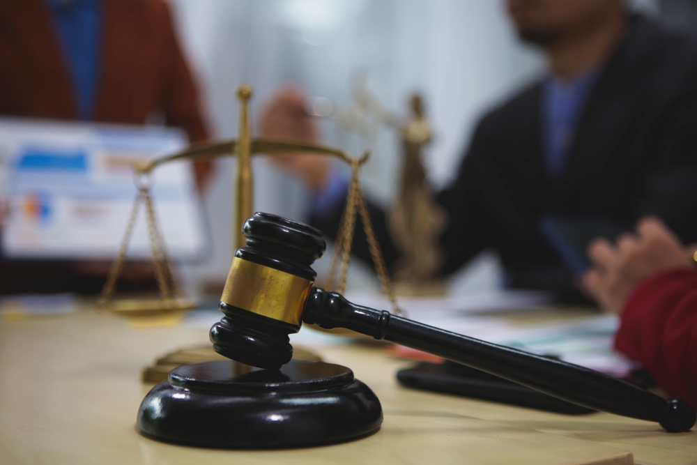 Lawyers,In,A,Meeting,Discuss,Case,Strategies,,Review,Evidence,,Prepare