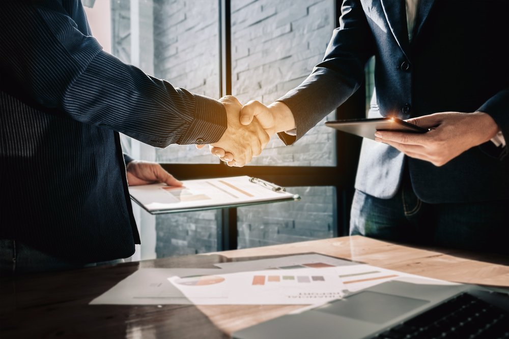 Young,Businessmen,Collaborate,With,Partners,To,Increase,Their,Business,Investment