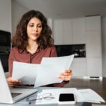 Focused,Latin,Hispanic,Young,Business,Woman,Working,On,Laptop,Computer