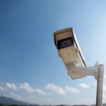 Ip,Cctv,Camera,Installed,On,High,Metal,Post,Of,Farmland