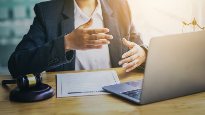 Lawyers,Consult,Online,Via,Video,Conferencing,System,By,Laptop.